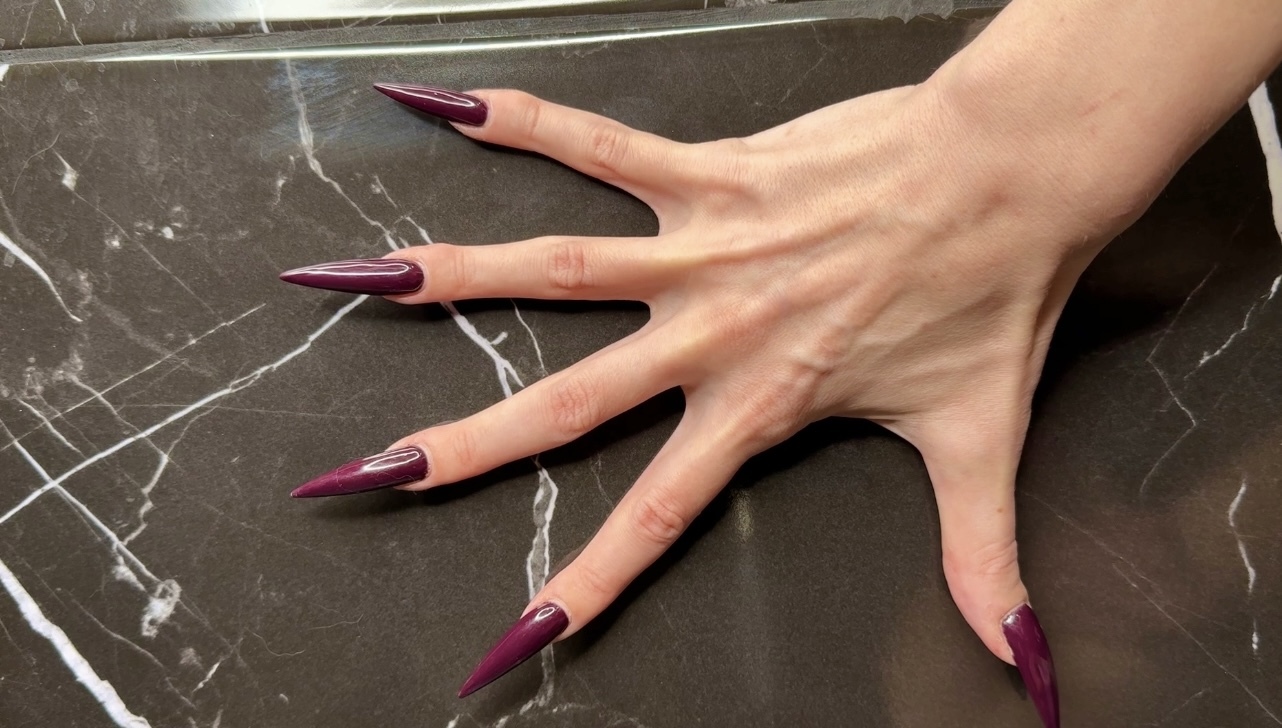 Dark purple long nails, claws, long flexible fingers wide palms, nail tapping