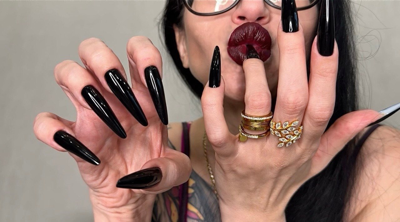 Black long nails, sharp claws, long fingers and hands worship