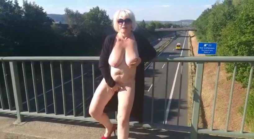 almost naked on the highway bridge