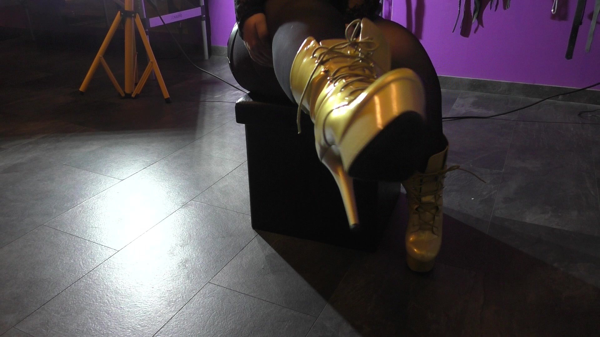 Take off golden platform boots