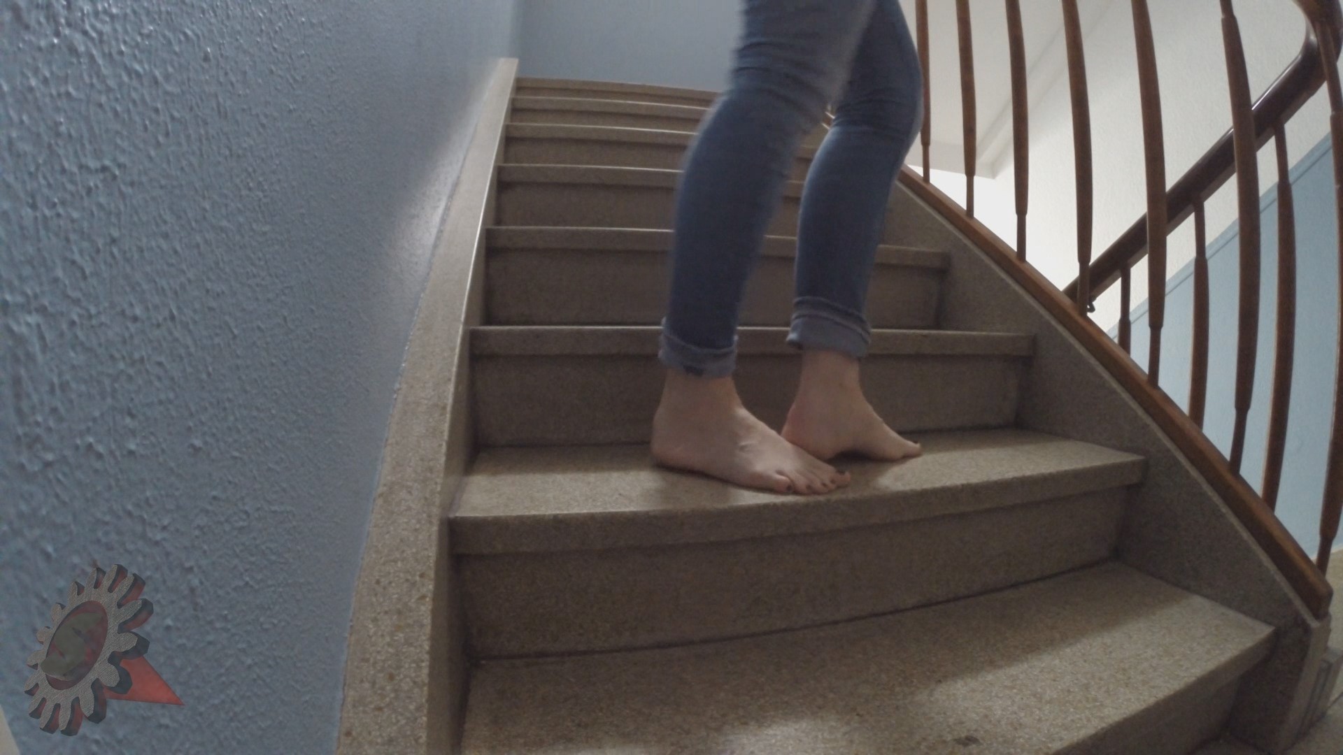 Bare feet in the stairwell