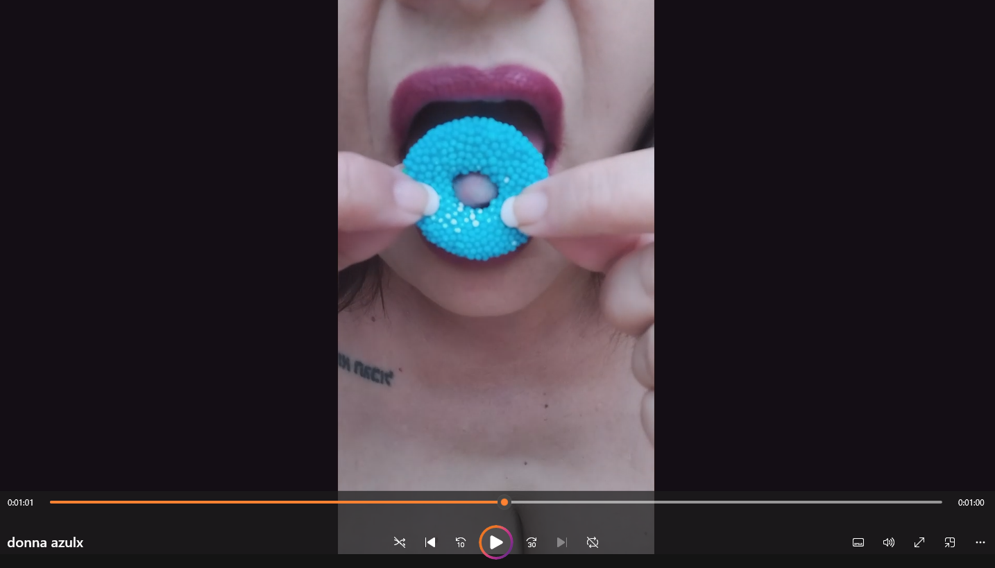 playing with a blue candy