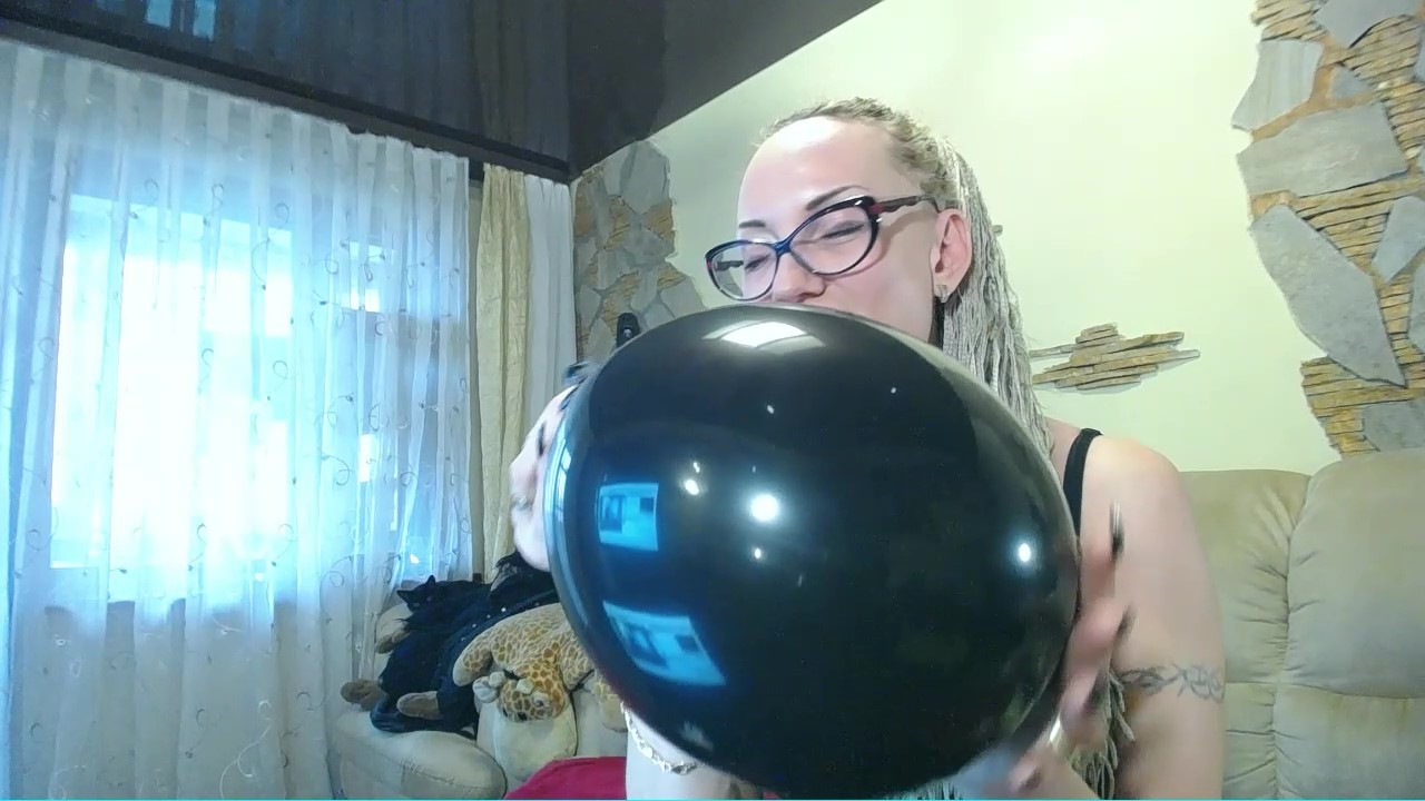 Blow black balloon topless (for looners)